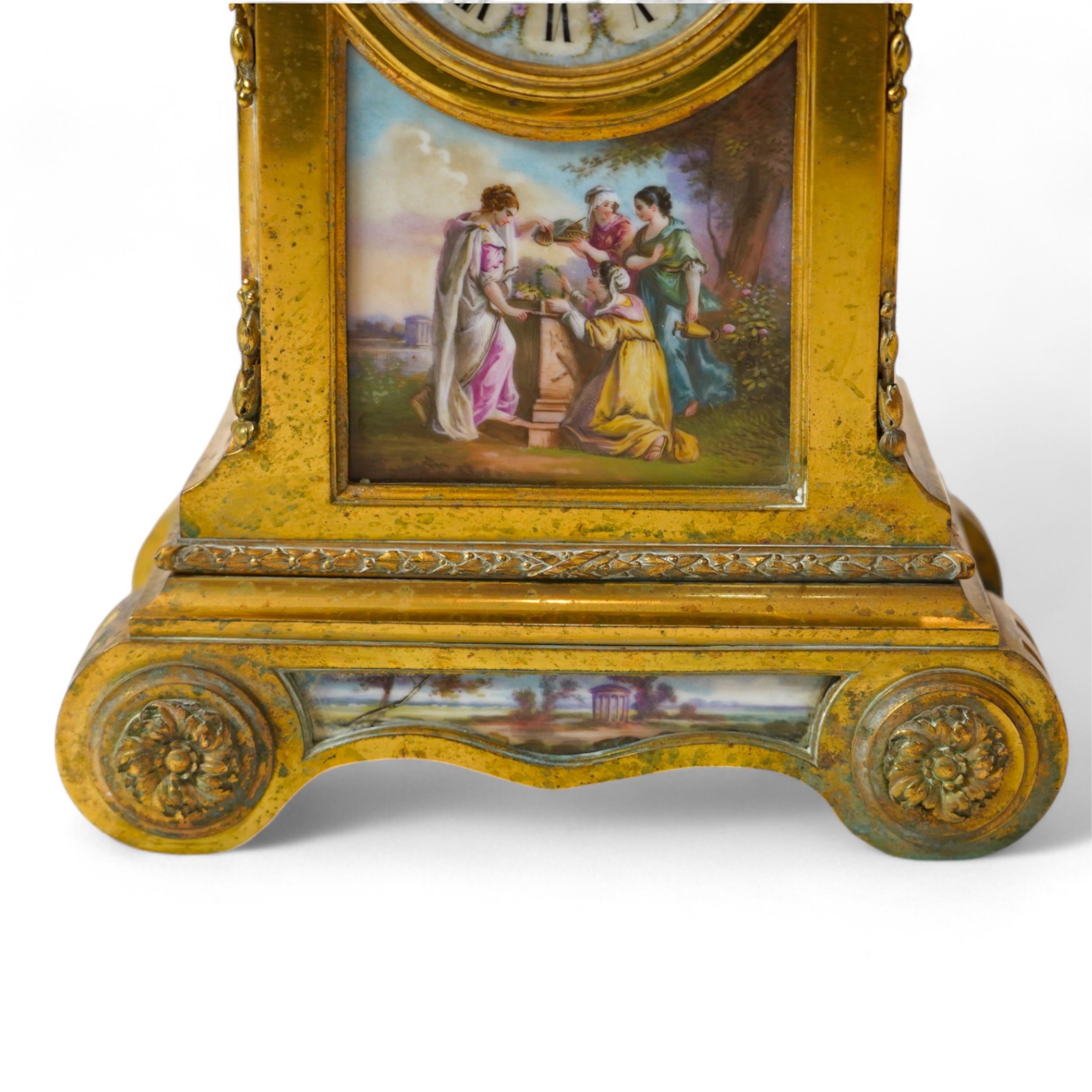 A Louis XVl style gilt brass cased eight day mantel clock